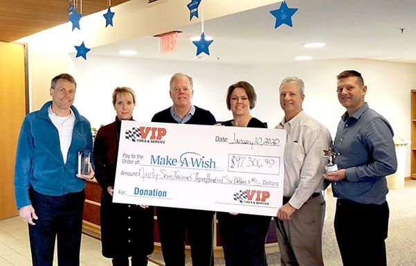 Executive Members of VIP Tires & Service present Kate Vickery, President & CEO of Make-A-Wish Maine with fundraising check