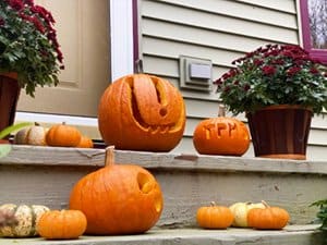 Jack-o-lanterns on a front step