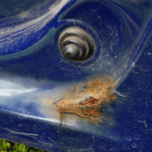 rust damage on the inside of a car door