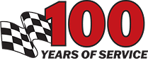 Red "100 Years of Service" logo with checkered flag design.
