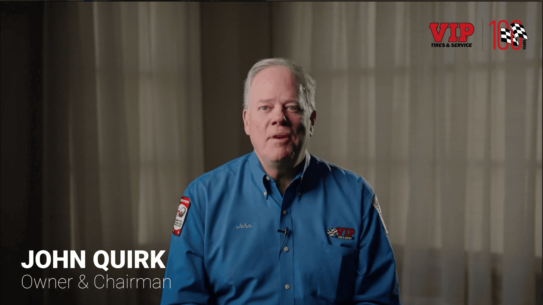 John Quirk, Owner & Chairman, wearing a blue VIP Tires & Service shirt.
