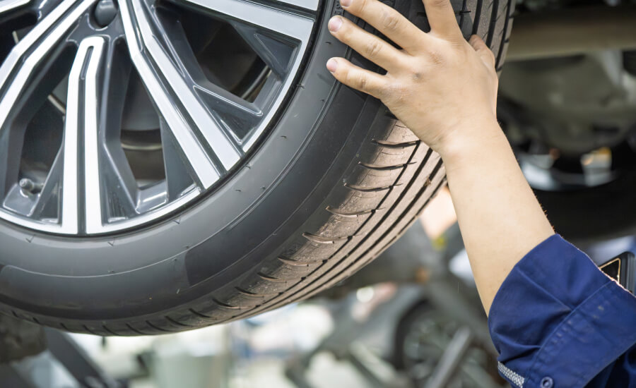 tire being inspected on lift